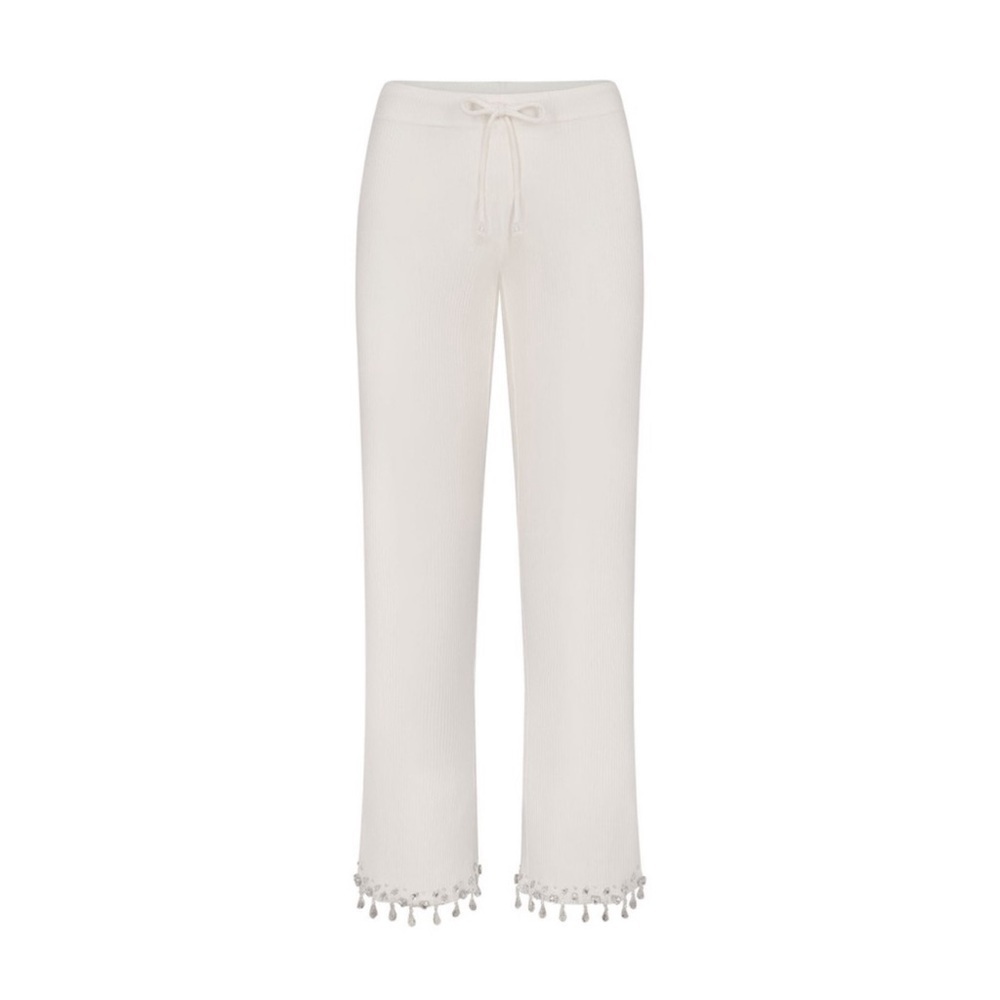 SKIMS New Collection. Cream Pants with Tassel Hem